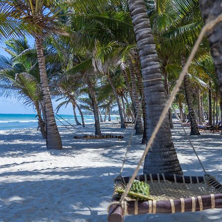 Amani Tiwi Beach Resort Exterior photo